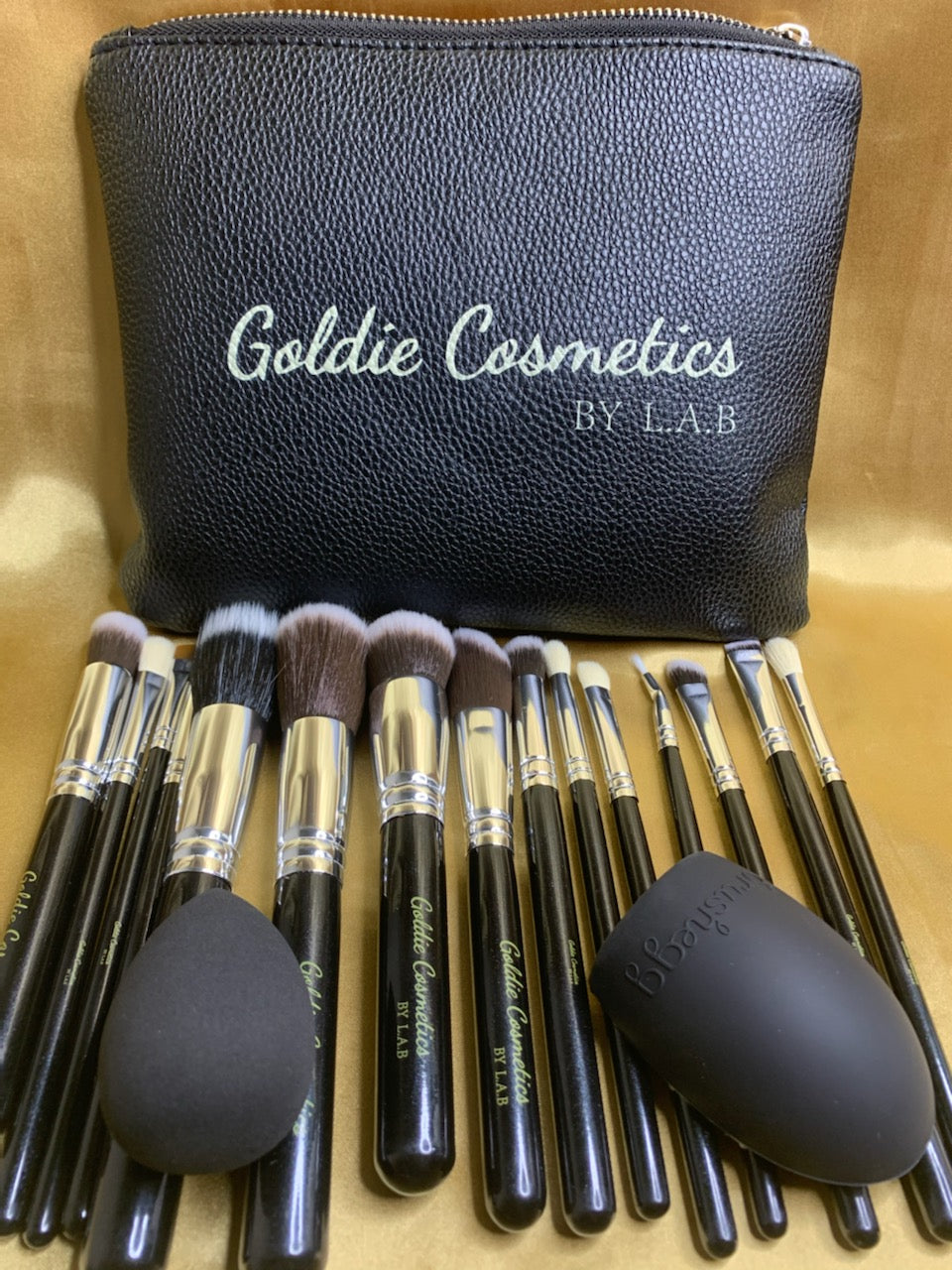 15 piece brushes with cosmetics bag, brush cleaner, and sponge
